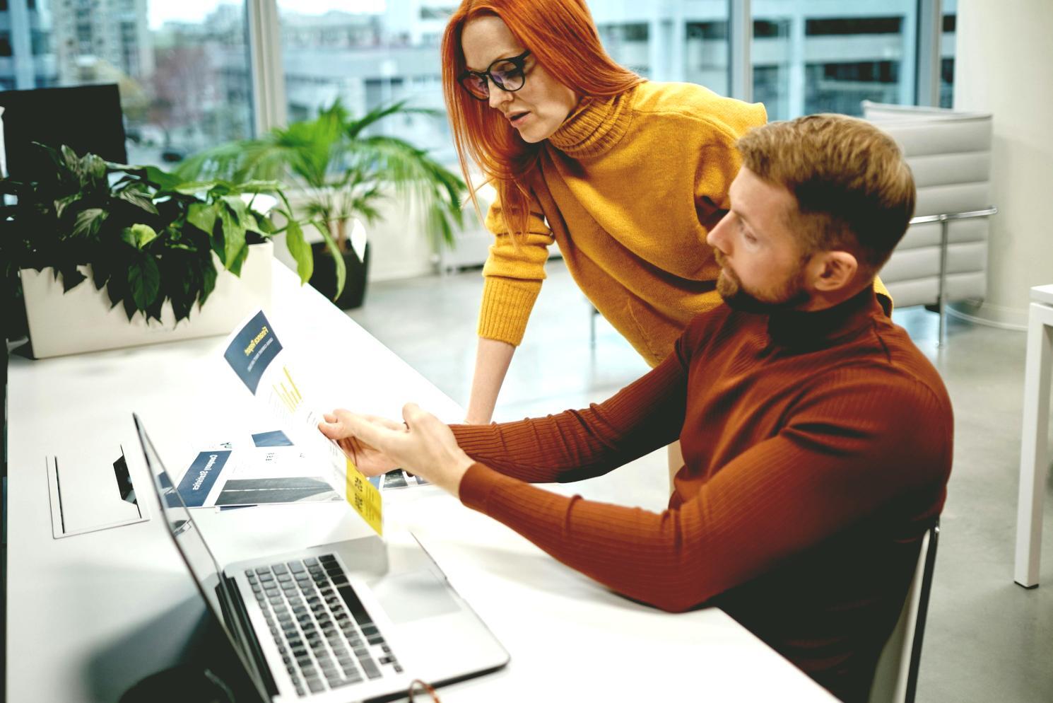 Corporate event venue setup with modern staging and lighting design